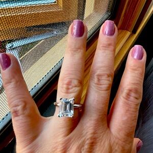 14 kt white gold 2 ct zirconia emerald cut solitaire.